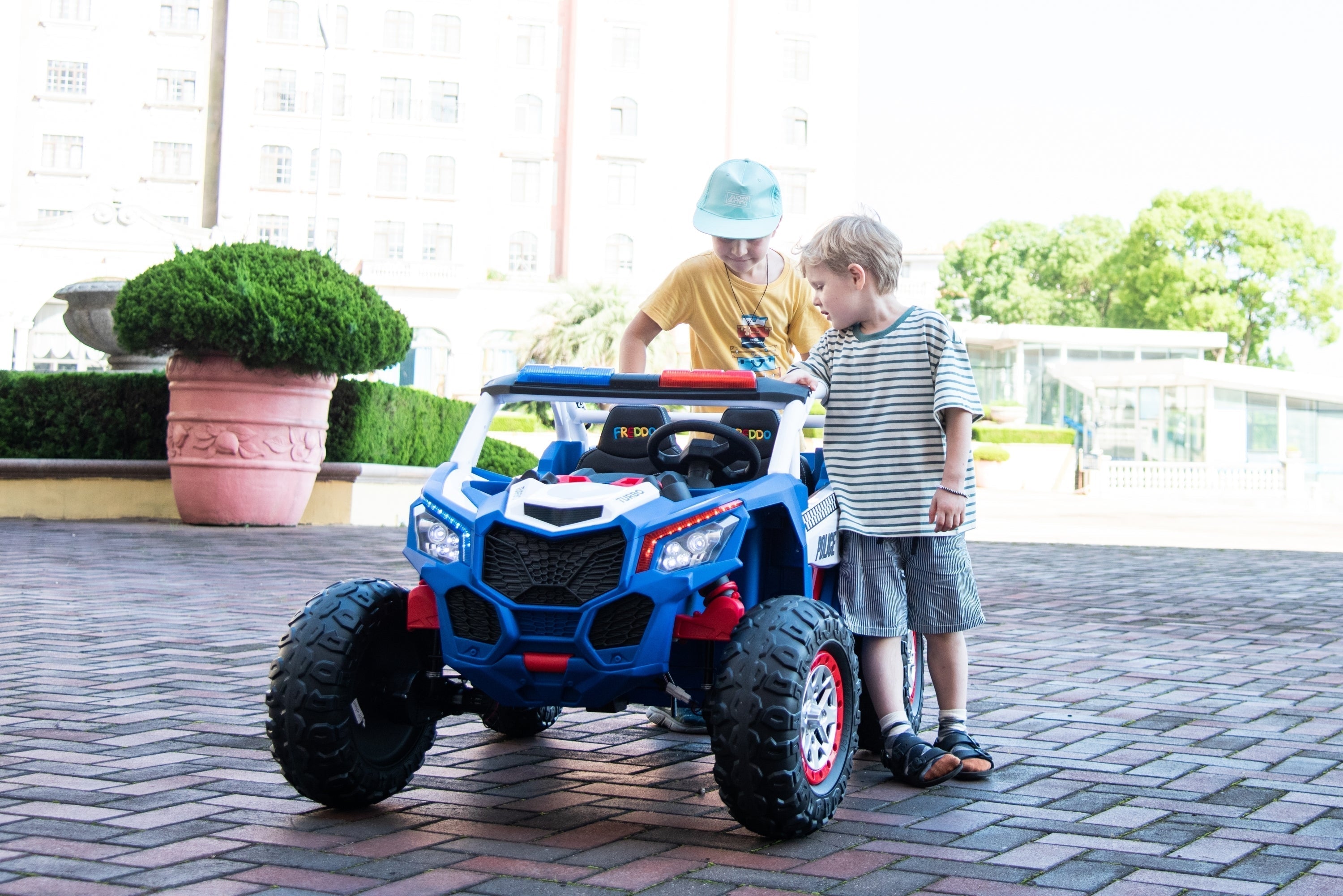 Review of the 24V Freddo Storm Police Car Toy 2-Seater with Lights & Sirens
