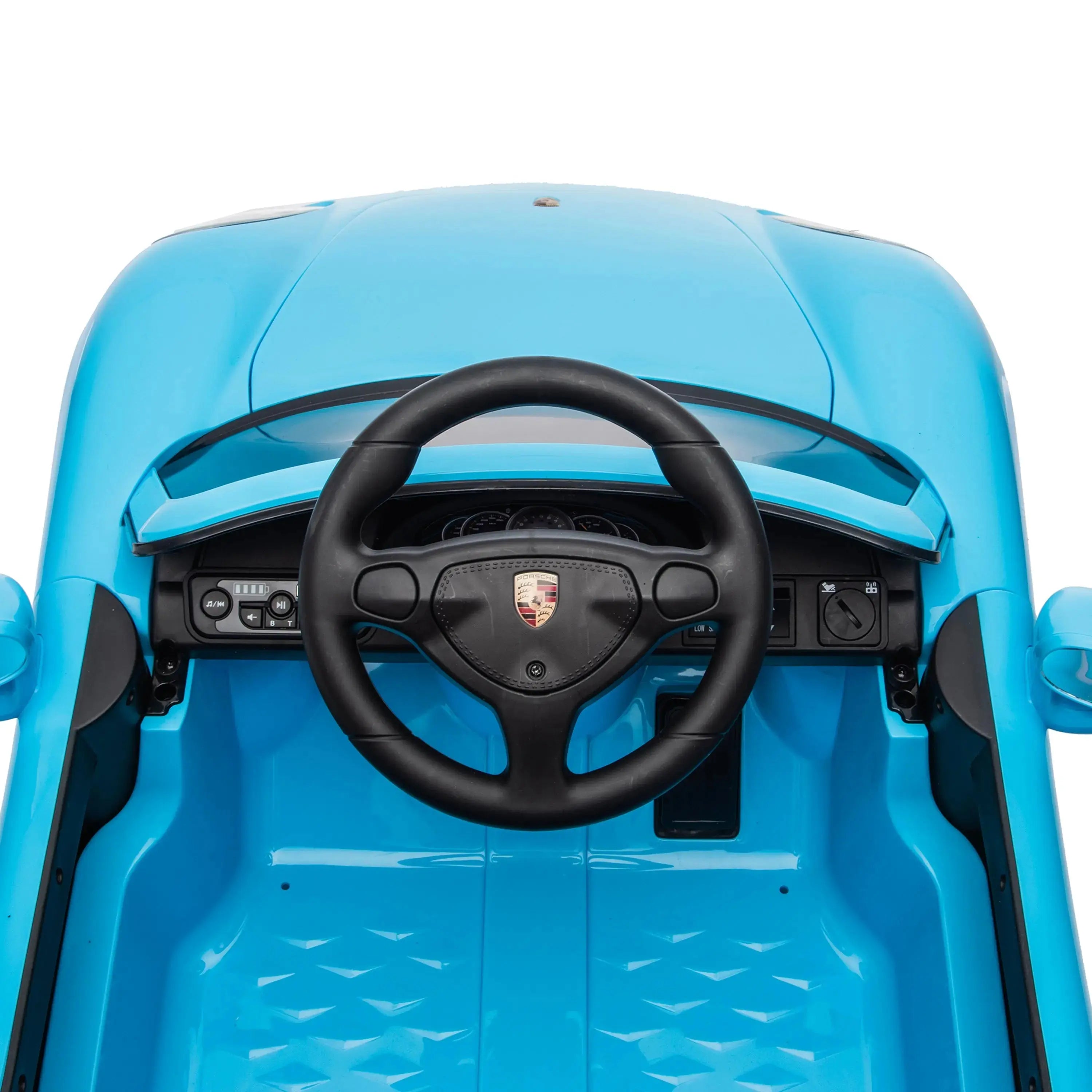 Child riding the 12V Porsche Carrera GT 1 Seater Ride on car (2) | Freddo Toys Canada