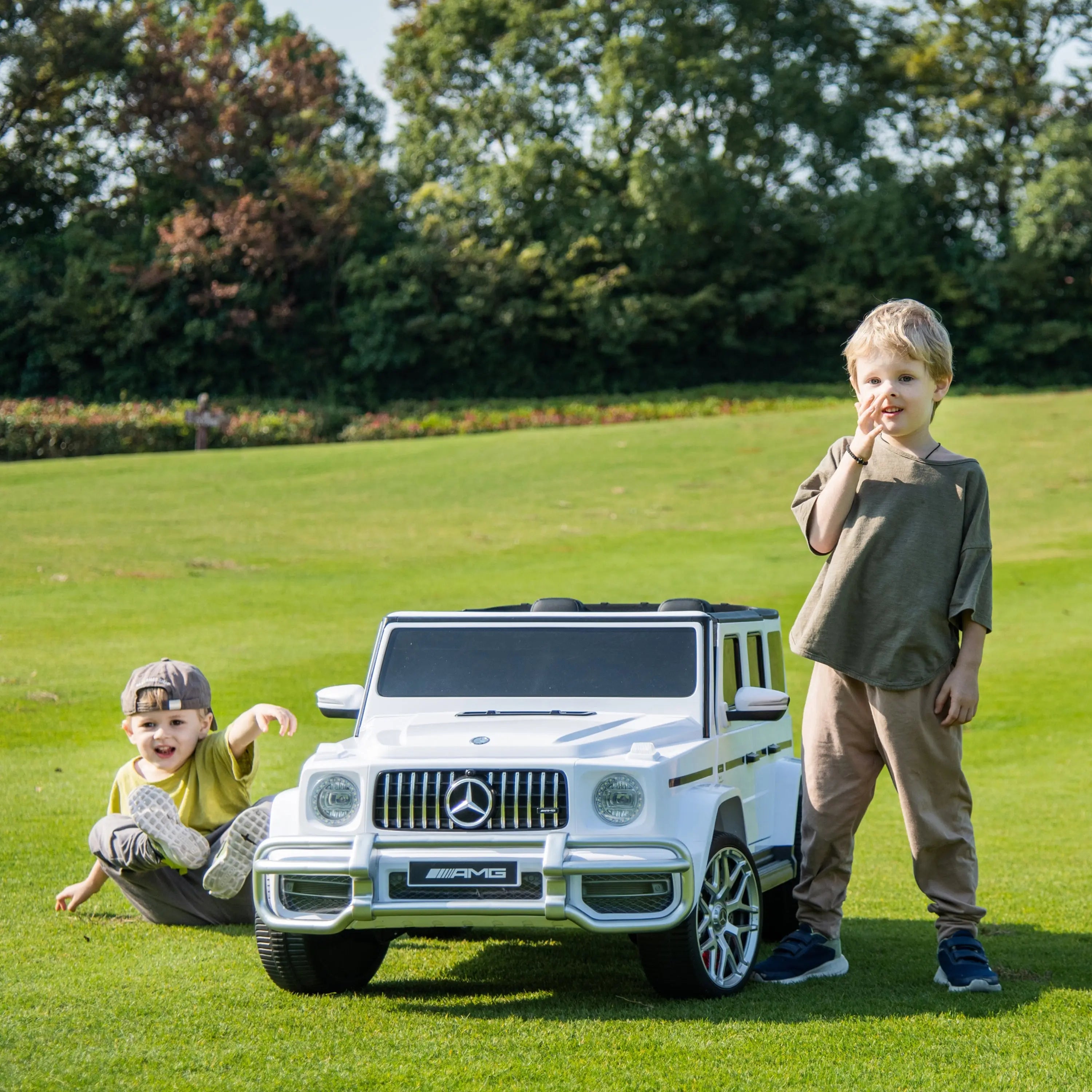 24V 4x4 Mercedes Benz G63 AMG 2 Seater G Wagon Ride on Car – steering wheel and controls | Freddo Toys Canada