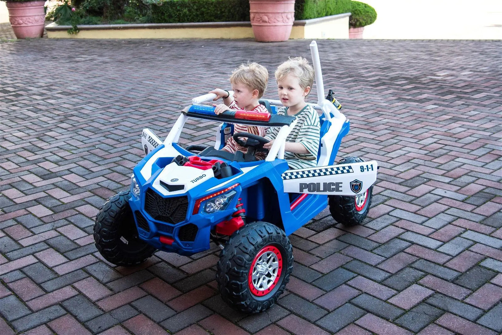24V 4x4 Freddo Storm Police UTV 2-Seater for Kids with Lights & Sirens for Action-Packed Adventures – wheels and suspension detail | Freddo Toys Canada