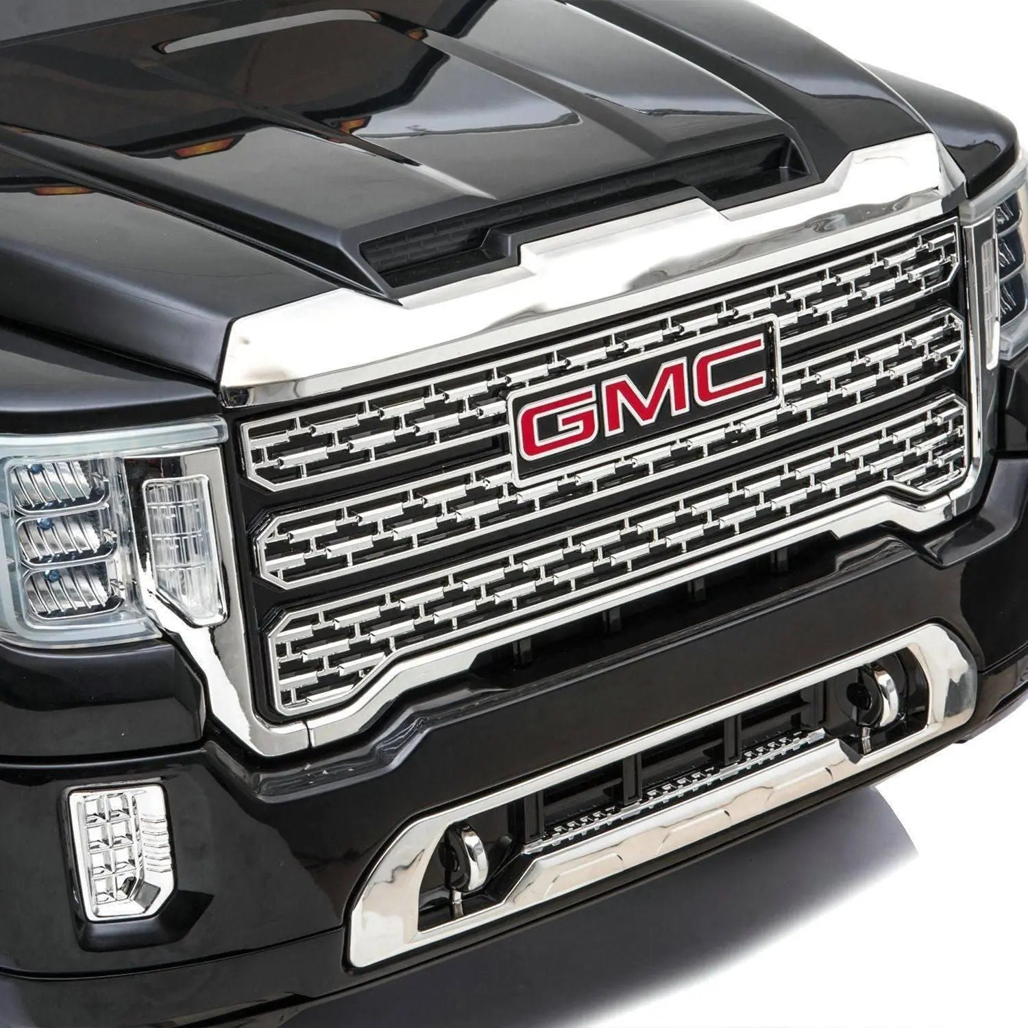 Child riding the 24V GMC Denali 2 Seater Ride on Car With Parental Remote Control by Freddo | Freddo Toys Canada