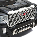 Child riding the 24V GMC Denali 2 Seater Ride on Car With Parental Remote Control by Freddo | Freddo Toys Canada