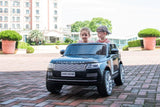 Child riding the 24V Range Rover HSE 2 Seater Ride on | Freddo Toys Canada