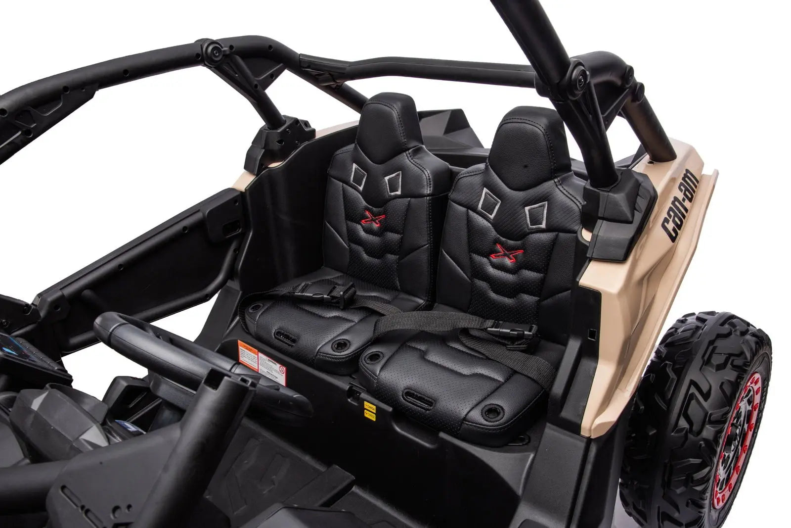 Child riding the 2x24V 4x4 Can-Am Maverick 2 Seater Ride on UTV for Kids | Freddo Toys Canada