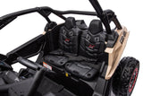 Child riding the 2x24V 4x4 Can-Am Maverick 2 Seater Ride on UTV for Kids | Freddo Toys Canada
