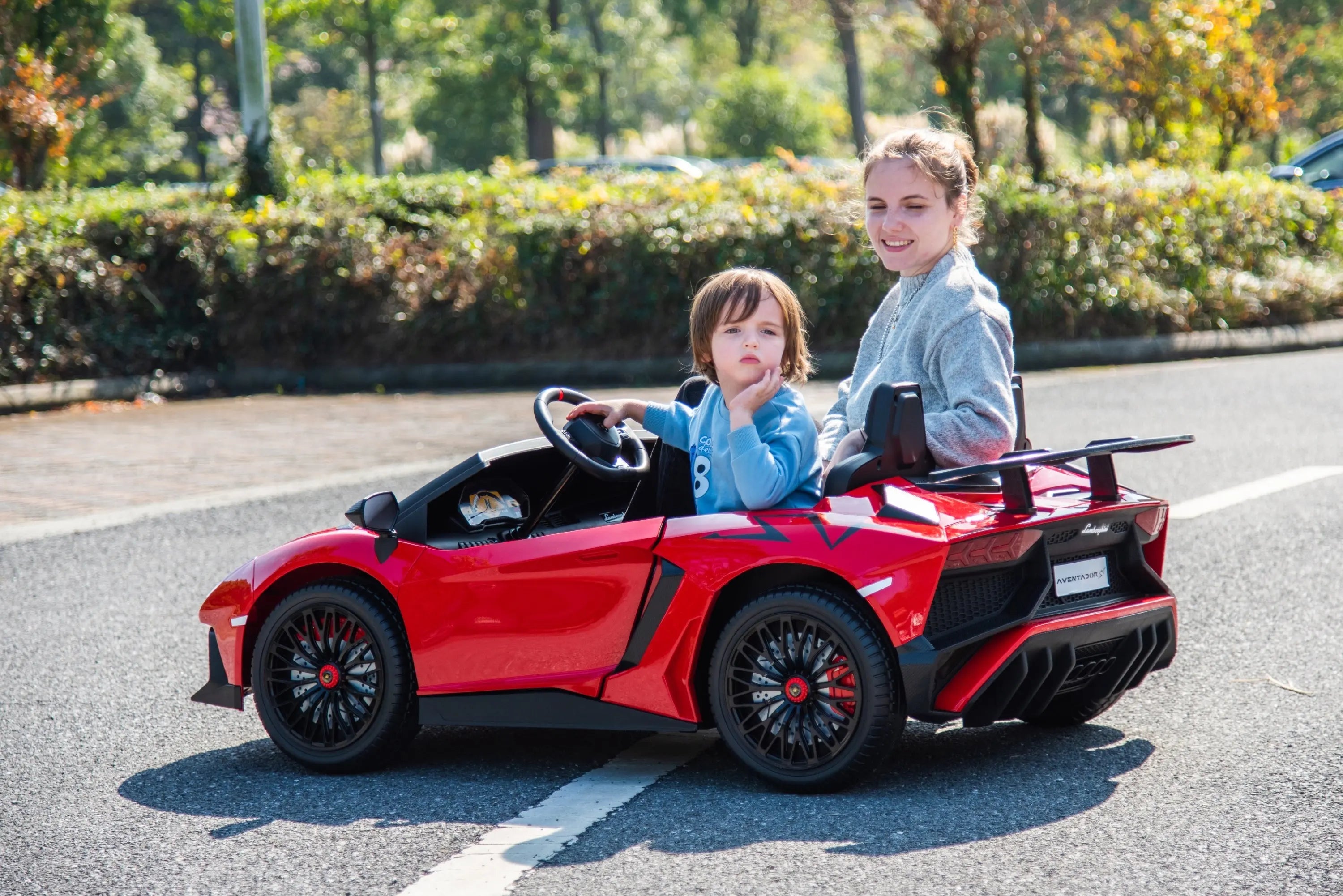 Child riding the 24V Lamborghini Aventador 2 Seater Ride On Car for Kids: Advanced Brushless Motor & Differential for High-Octane Fun | Freddo Toys Canada
